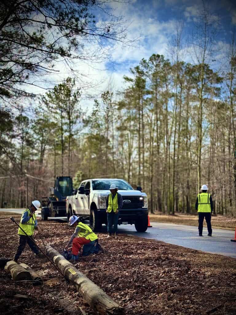 Storm debris and damaged utility infrastructure after Hurricane Helene in Georgia