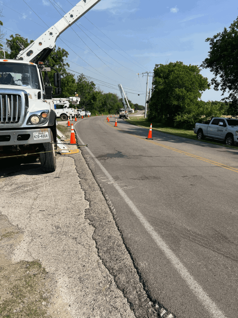 Storm-damaged utility lines and with MO Company crew on-hand to repair after severe weather event