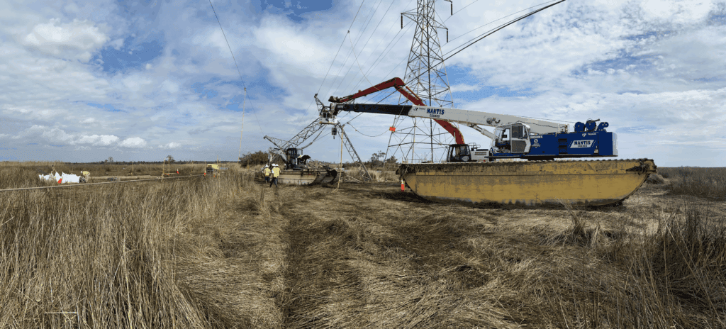 Storm-damaged utility poles and wires after storm