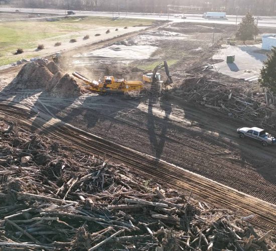 Arial view of storm response with piles of storm debris
