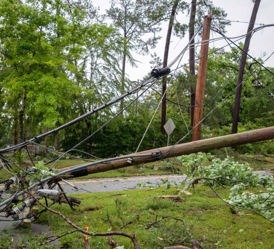 Storm debris and damaged utility infrastructure after Hurricane Helene in Georgia