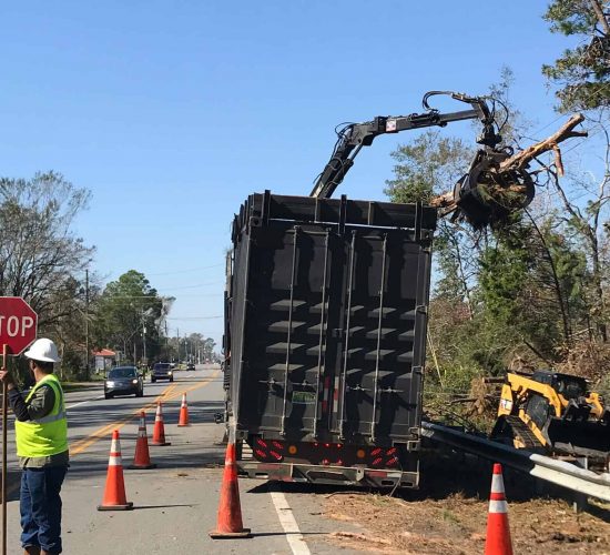 Storm response with debris and clean up efforts along road after Hurricane milton