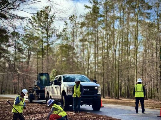 Storm debris and damaged utility infrastructure after Hurricane Helene in Georgia