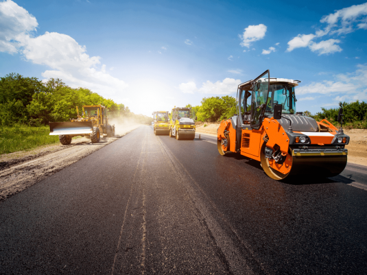 Heavy equipment on road repair