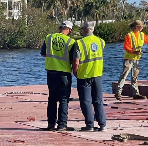 MOC-MO Story-coordination after Ian and Nicole Blue Lake Service and MO Equipment crew on barge for storm response and recovery
